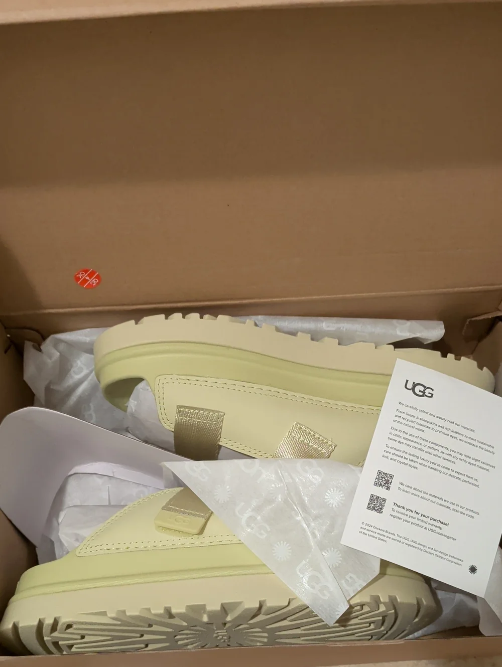 New UGG GoldenGlow Slide sandals
